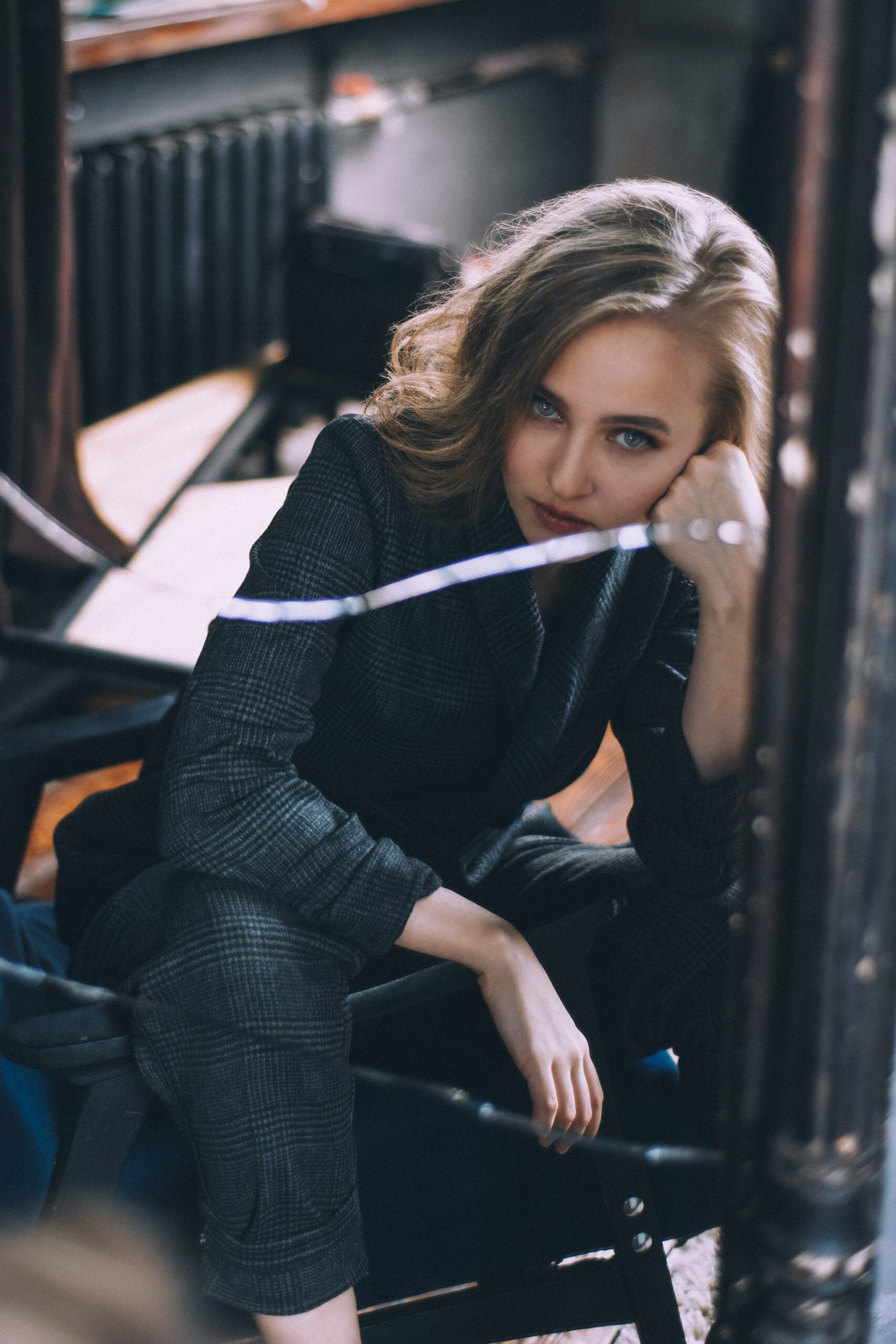 Fashion editorial shot of a woman in a suit